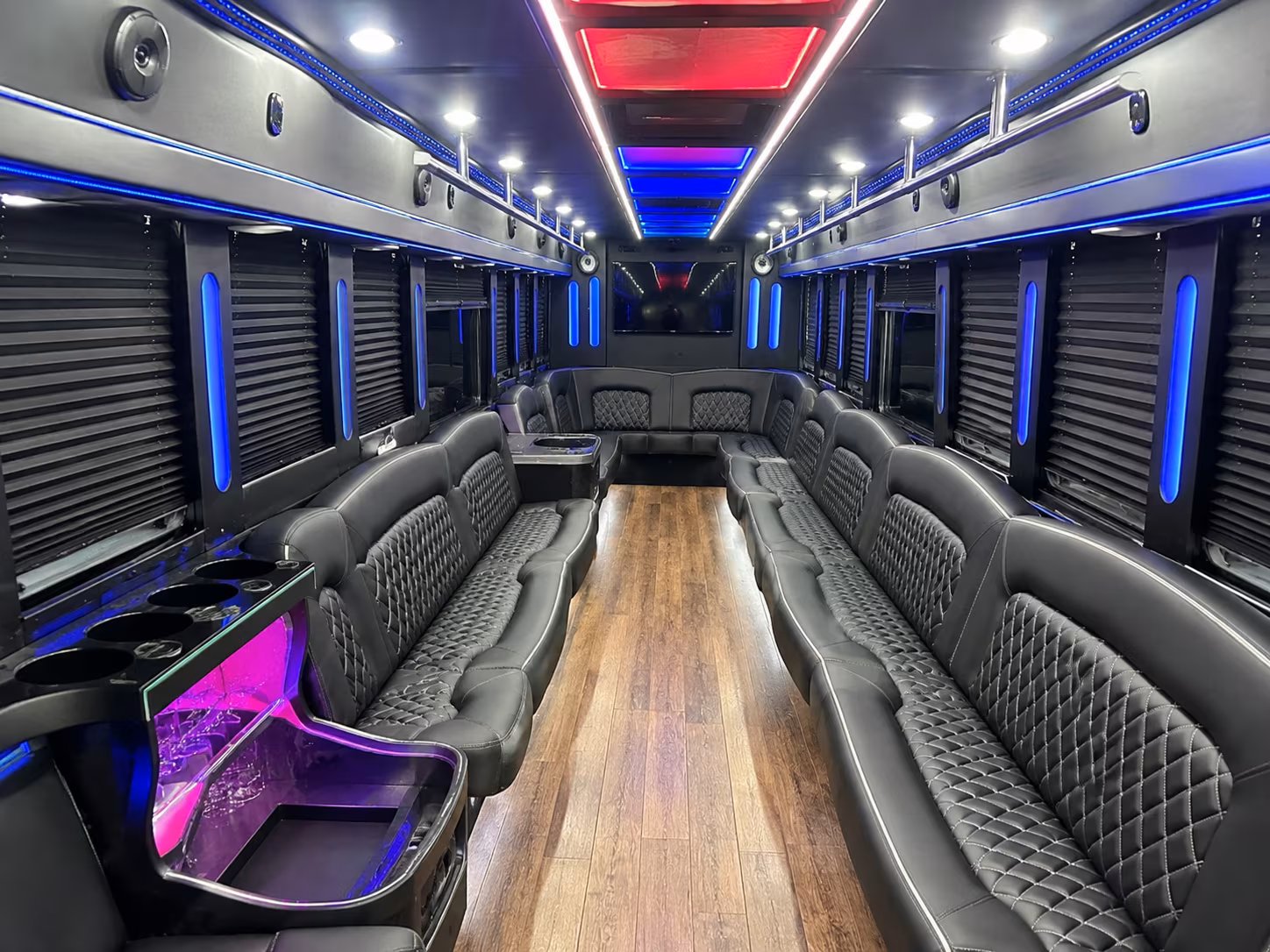 Wedding guests seated inside a party bus serving Los Angeles